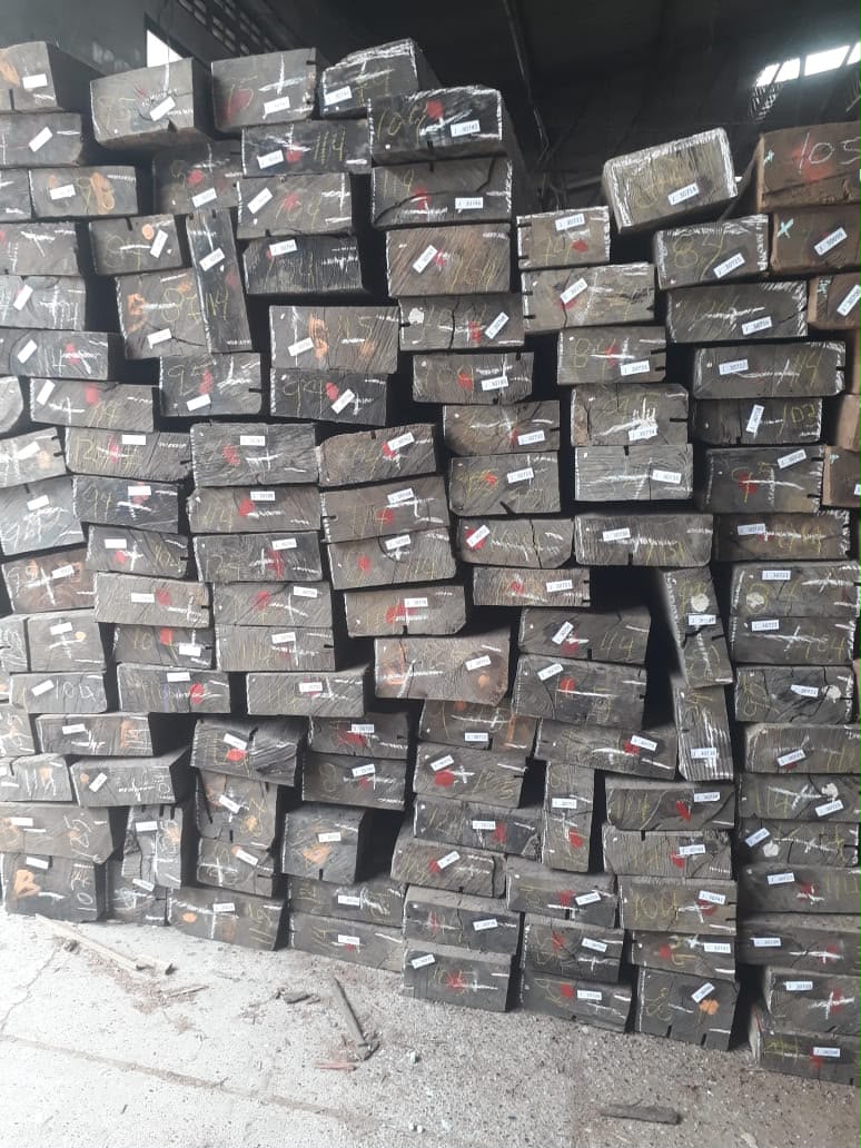 Cumaru squared timber blocks stacked and tagged for inventory tracking