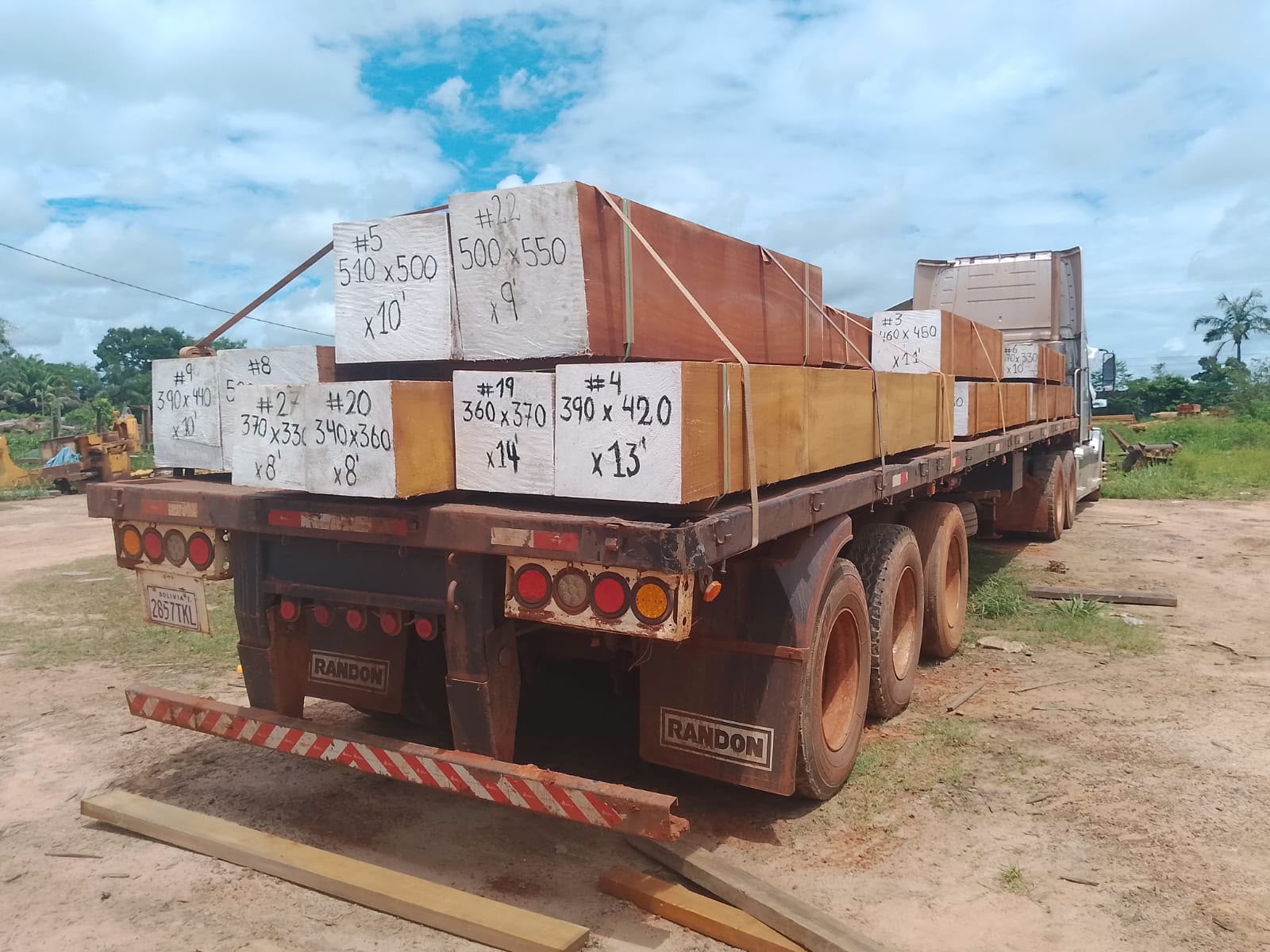 Squared Jatoba timber marked with dimensions, loaded on a truck in Bolivia